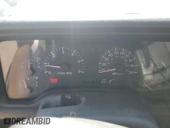 2001 Jeep Cherokee Sport z VIN 1J4FF58S61L540796, wystawiony jako Copart lot #62384895 z przebiegiem 209 294 mil mil oraz Czysty tytuł • Clean title. Historia ofert i sprzedaży dostępna na DreamBid. Obrazek 9.