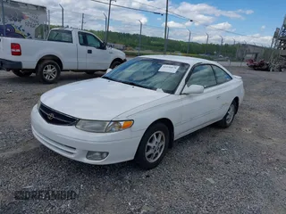 1999 Toyota Solara SE with VIN 2T1CF22PXXC233661, listed as a IAAI auction lot 42196878 with 157,682 mi miles. Bid and sale history available at carsss.com. Image 2.