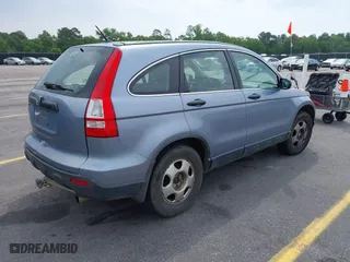2007 Honda CR-V LX with VIN JHLRE48317C057561, listed as a IAAI auction lot 42119266 with 307,373 mi miles. Bid and sale history available at carsss.com. Image 4.