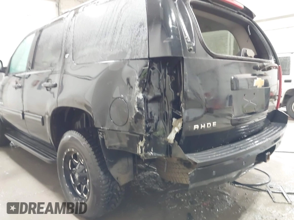 2013 Chevrolet Tahoe LT with VIN 1GNSKBE07DR305706, listed as a IAAI auction lot 42004594 with 166,020 mi miles and . Bid and sale history available at DreamBid. Image 6.