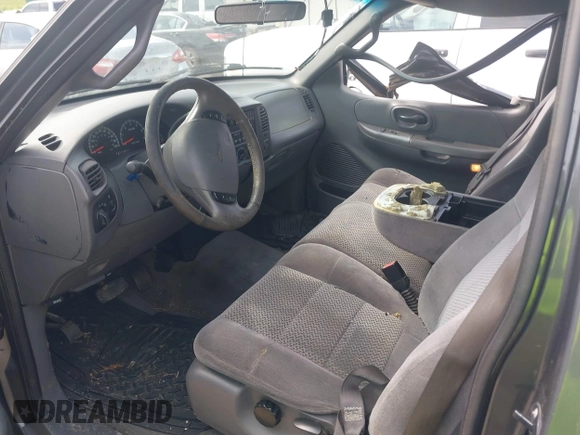 2002 Ford F-150 XL with VIN 1FTRX17W72NA87338, listed as a IAAI auction lot 42583398 with Not provided miles and . Bid and sale history available at DreamBid. Image 5.