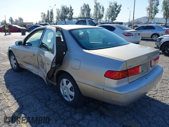 2001 Toyota Camry CE with VIN JT2BG22KX10559757, listed as a IAAI auction lot 41823719 with 72,775 mi miles. Bid and sale history available at carsss.com. Image 3.