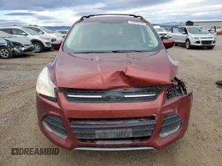 2015 Ford Escape SE with VIN 1FMCU9GX6FUC67715, listed as a Copart auction lot 73495244 with 184,183 mi miles and Salvage Title. Bid and sale history available at DreamBid. Image 5.