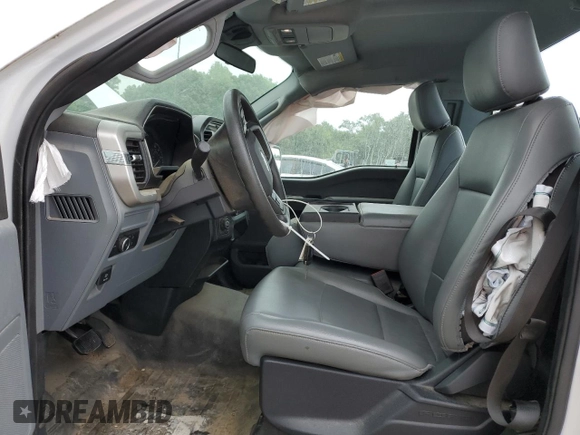 2021 Ford F-150 XL with VIN 1FTMF1EP7MKE72931, listed as a Copart auction lot 60650605 with 23,825 mi miles and Salvage title. Bid and sale history available at DreamBid. Image 7.
