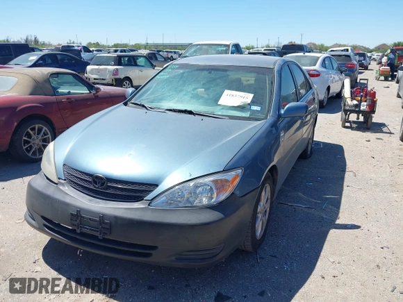 2004 Toyota Camry LE z VIN 4T1BE32K74U915657, wystawiony jako IAAI lot #41837915 z przebiegiem 260 096 mil mil oraz . Historia ofert i sprzedaży dostępna na DreamBid. Obrazek 2.