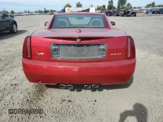 2005 Cadillac XLR z VIN 1G6YV34AX55600501, wystawiony jako Copart lot #72423004 z przebiegiem 31 601 mil mil oraz Szkody całkowita. Historia ofert i sprzedaży dostępna na DreamBid. Obrazek 6.