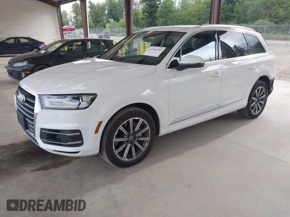 2017 Audi Q7 Premium with VIN WA1AAAF74HD006104, listed as a IAAI auction lot 42554741 with 95,276 mi miles and . Bid and sale history available at DreamBid. Image 2.