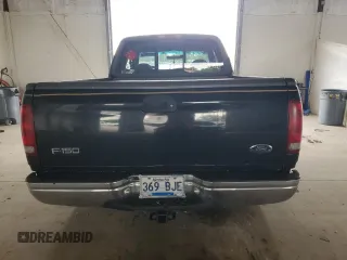 1999 Ford F-150 with VIN 1FTZX1723XNA24144, listed as a Copart auction lot 58071155 with 320,829 mi miles and Salvage title. Bid and sale history available at DreamBid. Image 6.
