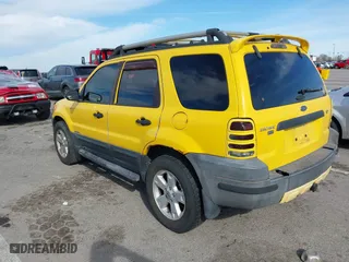 2003 Ford Escape XLT Popular 2 with VIN 1FMCU93153KC03710, listed as a IAAI auction lot 41834521 with 168,027 mi miles. Bid and sale history available at carsss.com. Image 3.