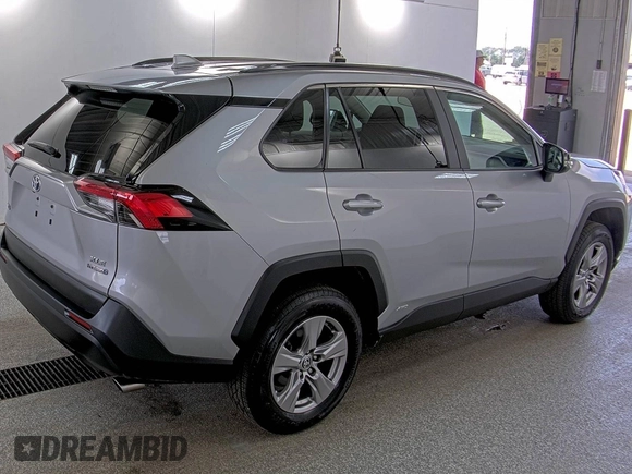 2023 Toyota RAV4 Hybrid XLE with VIN 2T3RWRFV9PW175446, listed as a IAAI auction lot 42806880 with 90,261 mi miles and . Bid and sale history available at DreamBid. Image 9.