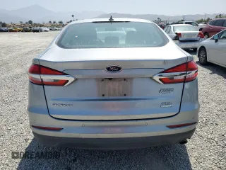 2020 Ford Fusion SEL z VIN 3FA6P0CD3LR196210, wystawiony jako Copart lot #60240925 z przebiegiem 81 768 mil mil oraz Szkoda całkowita • Salvage title. Historia ofert i sprzedaży dostępna na DreamBid. Obrazek 6.