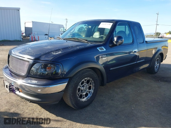 1999 Ford F-150 XL with VIN 1FTRX17L4XKA58054, listed as a IAAI auction lot 41647530 with 225,632 mi miles. Bid and sale history available at carsss.com. Image 17.