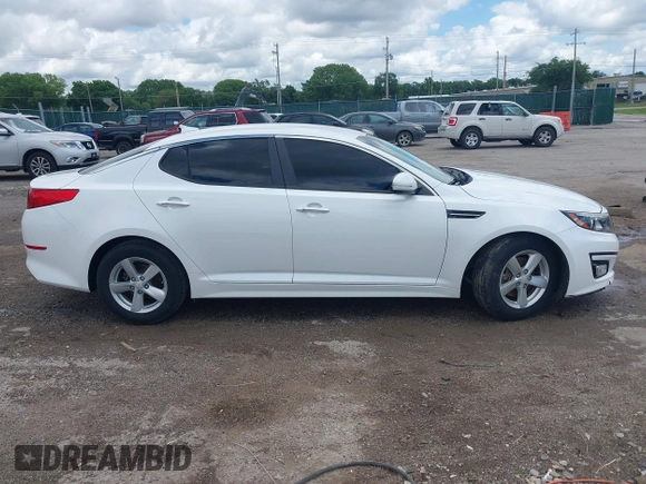 2015 Kia Optima LX with VIN KNAGM4A74F5653459, listed as a IAAI auction lot 42443188 with 109,129 mi miles and . Bid and sale history available at DreamBid. Image 14.