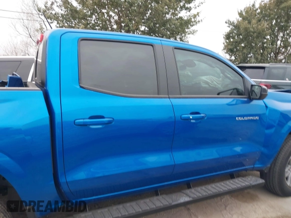2024 Chevrolet Colorado 2WD LT z VIN 1GCGSCECXR1154560, wystawiony jako IAAI lot #41388658 z przebiegiem 12 909 mil mil oraz . Historia ofert i sprzedaży dostępna na DreamBid. Obrazek 14.