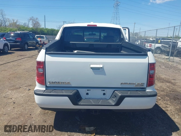 2009 Honda Ridgeline RTL with VIN 5FPYK16529B107871, listed as a IAAI auction lot 42049833 with 141,214 mi miles. Bid and sale history available at carsss.com. Image 17.