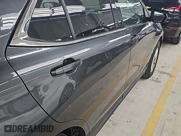 2020 Chevrolet Equinox LT z VIN 2GNAXJEV5L6232400, wystawiony jako IAAI lot #42575814 z przebiegiem 110 520 mil mil oraz . Historia ofert i sprzedaży dostępna na DreamBid. Obrazek 26.