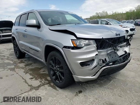 2018 Jeep Grand Cherokee Laredo E with VIN 1C4RJFAG0JC173200, listed as a Copart auction lot 55326805 with 127,489 mi miles and Salvage Title. Bid and sale history available at DreamBid. Image 14.