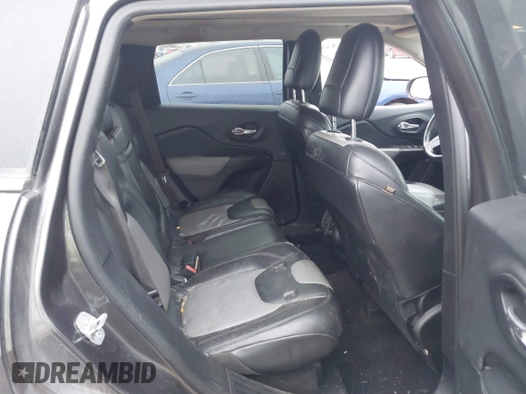 2014 Jeep Cherokee Limited with VIN 1C4PJLDS9EW301718, listed as a IAAI auction lot 41615778 with 114,022 mi miles and . Bid and sale history available at DreamBid. Image 8.