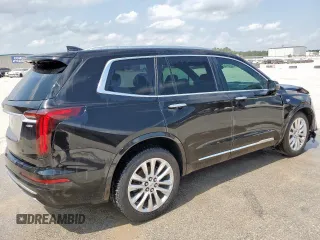 2020 Cadillac XT6 FWD Premium Luxury z VIN 1GYKPCRSXLZ104502, wystawiony jako Copart lot #58211275 z przebiegiem 97 053 mil mil oraz Szkody całkowita. Historia ofert i sprzedaży dostępna na DreamBid. Obrazek 3.
