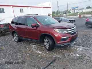 2018 Honda Pilot EX-L with VIN 5FNYF6H55JB071749, listed as a IAAI auction lot 42470413 with 74,080 mi miles and . Bid and sale history available at DreamBid. Image 1.