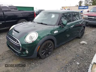 2016 MINI Cooper Hardtop 4 Door S with VIN WMWXU3C58G2D31595, listed as a IAAI auction lot 41267547 with 145,191 mi miles. Bid and sale history available at carsss.com. Image 17.