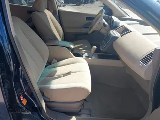 2003 Nissan Murano SL with VIN JN8AZ08T43W122455, listed as a IAAI auction lot 41560795 with 137,655 mi miles and . Bid and sale history available at carsss.com. Image 5.