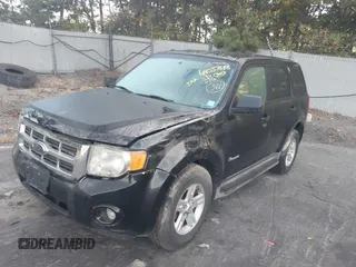 2011 Ford Escape Hybrid with VIN 1FMCU4K3XBKB04742, listed as a IAAI auction lot 40557688 with 258,767 mi miles and . Bid and sale history available at DreamBid. Image 2.