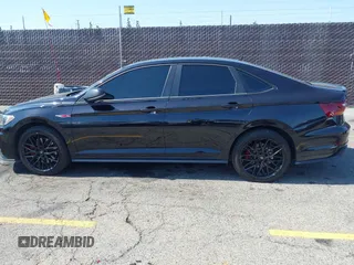 2019 Volkswagen Jetta GLI S z VIN 3VW6T7BU4KM255418, wystawiony jako IAAI lot #42141020 z przebiegiem 74 066 mil mil oraz . Historia ofert i sprzedaży dostępna na DreamBid. Obrazek 14.