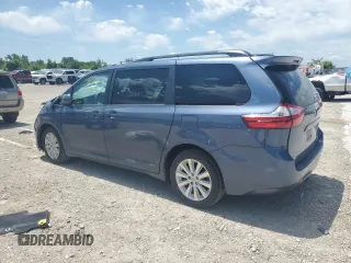 2015 Toyota Sienna LE with VIN 5TDJK3DC4FS107711, listed as a Copart auction lot 57693005 with 141,370 mi miles and Salvage title. Bid and sale history available at DreamBid. Image 2.