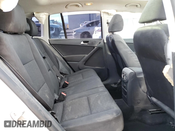 2013 Volkswagen Tiguan S with VIN WVGAV3AX8DW559779, listed as a Copart auction lot 87512845 with 79,169 mi miles and Salvage title. Bid and sale history available at DreamBid. Image 12.