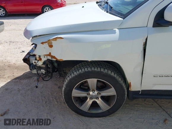 2016 Jeep Compass High Altitude with VIN 1C4NJDEB4GD767731, listed as a IAAI auction lot 41977400 with 99,890 mi miles and . Bid and sale history available at DreamBid. Image 6.