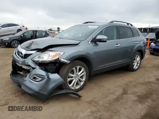 2012 Mazda CX-9 Grand Touring z VIN JM3TB3DA3C0341061, wystawiony jako Copart lot #59908565 z przebiegiem 164 590 mil mil oraz Czysty tytuł • Clean title. Historia ofert i sprzedaży dostępna na DreamBid. Obrazek 1.