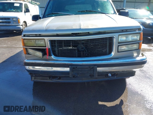 1998 GMC Yukon with VIN 1GKEK13R4WJ725608, listed as a IAAI auction lot 41596559 with 323,141 mi miles. Bid and sale history available at carsss.com. Image 13.