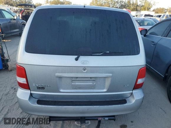 2004 Kia Sedona LX with VIN KNDUP131046591151, listed as a Copart auction lot 82201894 with 147,194 mi miles and Salvage Title. Bid and sale history available at carsss.com. Image 6.