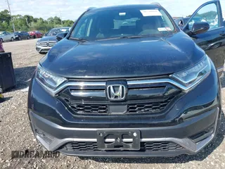 2022 Honda CR-V Touring with VIN 7FARW2H9XNE054892, listed as a IAAI auction lot 40230020 with 24,440 mi miles. Bid and sale history available at carsss.com. Image 6.
