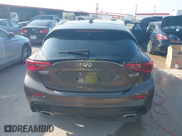 2017 Infiniti QX30 Premium z VIN SJKCH5CP4HA023330, wystawiony jako IAAI lot #42407253 z przebiegiem 132 317 mil mil oraz . Historia ofert i sprzedaży dostępna na DreamBid. Obrazek 15.