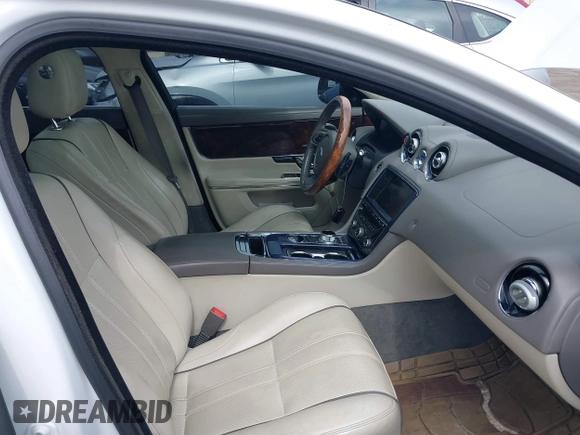 2013 Jaguar XJ Portfolio with VIN SAJWJ2GD3D8V48238, listed as a IAAI auction lot 40435160 with 136,738 mi miles and . Bid and sale history available at DreamBid. Image 5.