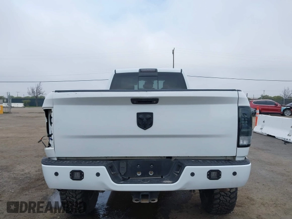 2014 Ram 2500 with VIN 3C6TR5KT3EG309771, listed as a IAAI auction lot 41213964 with 136,617 mi miles and . Bid and sale history available at DreamBid. Image 17.