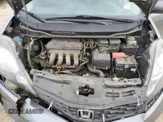 2013 Honda Fit Sport z VIN LUCGE8H70D3007465, wystawiony jako Copart lot #53542045 z przebiegiem 223 335 mil mil oraz Szkoda całkowita • Salvage title. Historia ofert i sprzedaży dostępna na DreamBid. Obrazek 11.