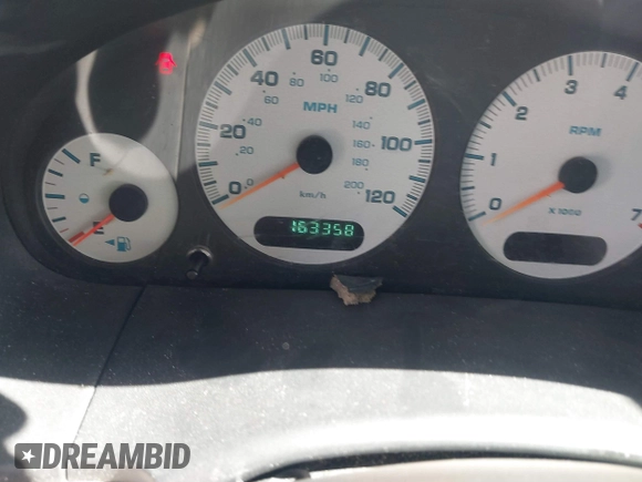 2003 Dodge Grand Caravan with VIN 2D4GP443X3R171373, listed as a IAAI auction lot 41645178 with 163,358 mi miles and . Bid and sale history available at DreamBid. Image 7.