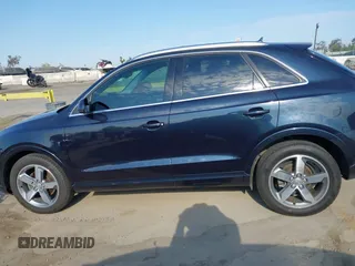 2015 Audi Q3 Premium Plus с VIN WA1EFCFSXFR007096, выставлен на аукционе IAAI как лот 42781603 с пробегом 156 717 миль миль и . История ставок и продаж доступна на DreamBid. Изображение 14.