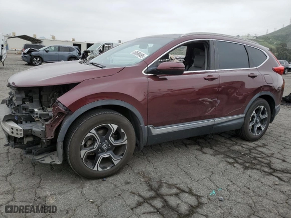 2019 Honda CR-V Touring with VIN 7FARW1H9XKE014219, listed as a Copart auction lot 50588485 with 70,566 mi miles and Salvage Title. Bid and sale history available at carsss.com. Image 1.