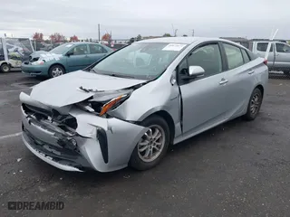 2022 Toyota Prius L Eco with VIN JTDKAMFU0N3175104, listed as a IAAI auction lot 40873671 with 1 mi miles. Bid and sale history available at carsss.com. Image 2.