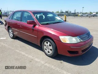 2001 Toyota Avalon XL w/Bucket Seats with VIN 4T1BF28BX1U175127, listed as a IAAI auction lot 42169111 with 180,436 mi miles. Bid and sale history available at carsss.com. Image 1.