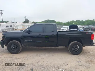 2016 Chevrolet Silverado 1500 LT with VIN 1GCVKREC4GZ113687, listed as a IAAI auction lot 42107434 with 95,577 mi miles and . Bid and sale history available at DreamBid. Image 14.