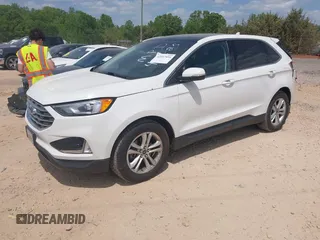 2020 Ford Edge SEL z VIN 2FMPK3J90LBA23025, wystawiony jako IAAI lot #42057424 z przebiegiem 47 119 mil mil oraz . Historia ofert i sprzedaży dostępna na DreamBid. Obrazek 2.