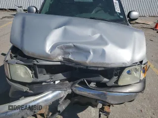 2003 Ford F-150 XLT with VIN 1FTRW08L03KD74119, listed as a Copart auction lot 47373105 with 303,513 mi miles and Salvage Title. Bid and sale history available at carsss.com. Image 13.
