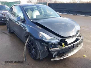 2020 Tesla Model Y Long Range with VIN 5YJYGDEF5LF042124, listed as a IAAI auction lot 41606884 with 111,756 mi miles and . Bid and sale history available at DreamBid. Image 1.
