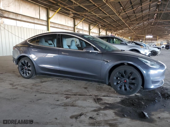 2020 Tesla Model 3 Standard Range Plus with VIN 5YJ3E1EA7LF614913, listed as a Copart auction lot 48518555 with 121,482 mi miles and Salvage Title. Bid and sale history available at carsss.com. Image 4.