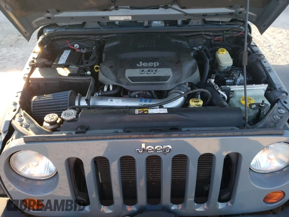 2013 Jeep Wrangler Unlimited Rubicon 10th Anniversary z VIN 1C4HJWFG0DL704100, wystawiony jako Copart lot #75573634 z przebiegiem 103 158 mil mil oraz Szkoda całkowita • Salvage title. Historia ofert i sprzedaży dostępna na DreamBid. Obrazek 12.